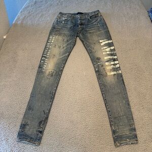 AMIRI - Military Stencil Skinny-Fit Logo-Print Distressed Jeans - Blue 31x34”